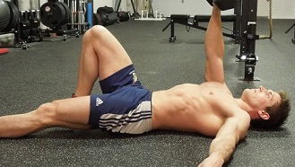 Dumbbell Toe-Touch Crunch